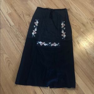 Black skirt with pastel embroidery